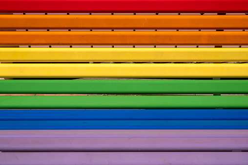 the Gay Pride flag composed of the eight colors of the rainbow. Each color represents a feeling: sex, life, healing, sunlight, nature, magic / arts, serenity and spirit