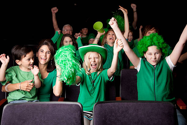 istock Sports Fans: Adults Children Cheering Event Spectators Team Color Green 161165754