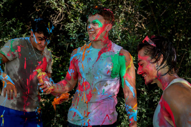 istock Young men playing in a paint fight 1611658006