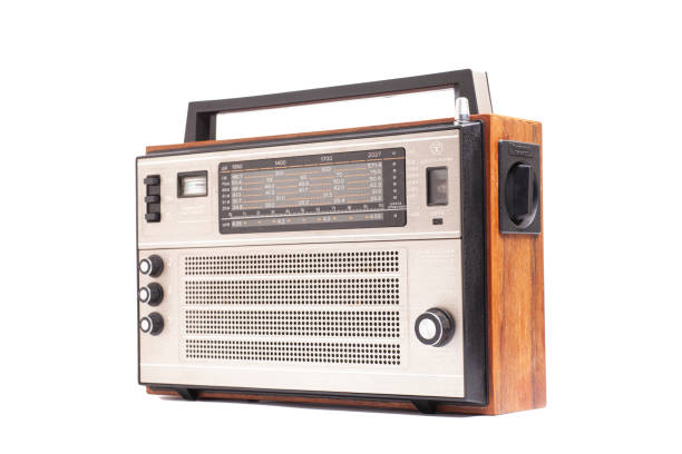 istock Old transistor radio isolated on white 1611666442