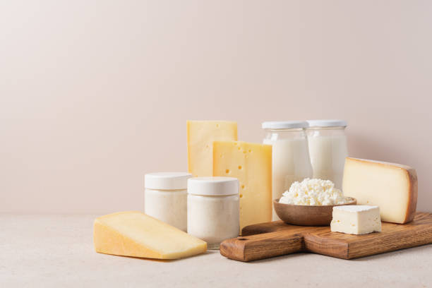istock Farm dairy products on beige background 1611688102