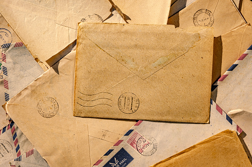 old envelopes with stamps, top view