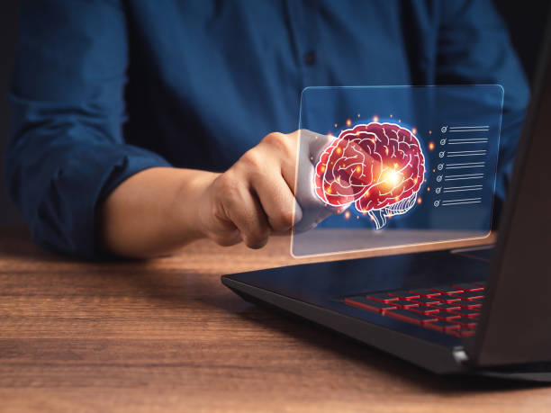 istock Hand pointing of the brain on a virtual screen. Concept of AI Technology 1611709465