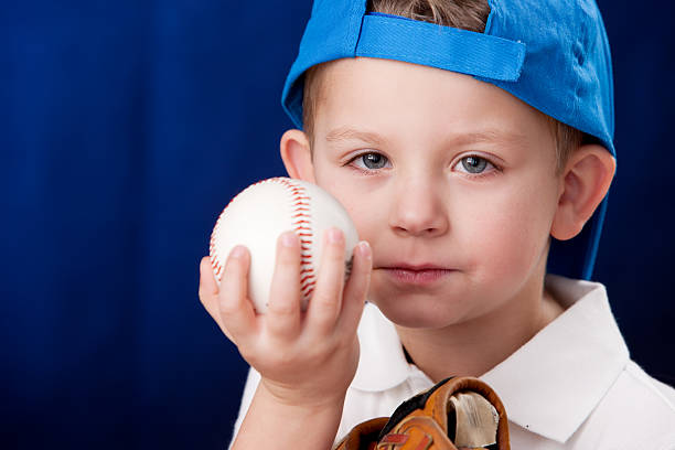istock Real People: Serious Caucasian Little Boy Head Shoulders Baseball 161174880