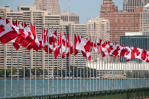 Canadian flags across river from Detroit Michigan