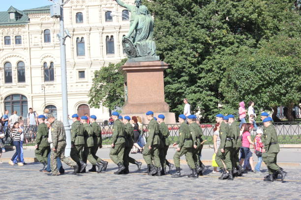 Moscow, Russia - August 8, 2016: Mobilized young soldiers marching on square in Moscow