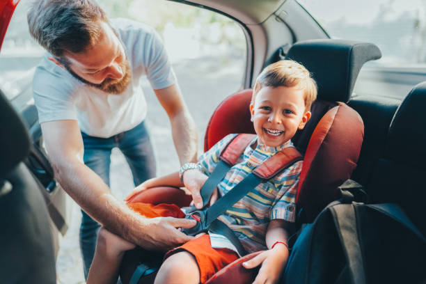 istock Father taking his son to school 1611825253