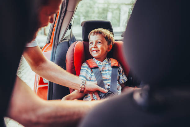 istock Father taking his son to school 1611825822