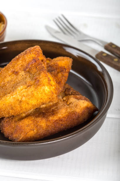 istock Pieces of cod in breadcrumbs. 1611840497