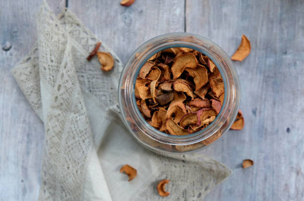 istock dried apples in a jar on gray boards 1611857043