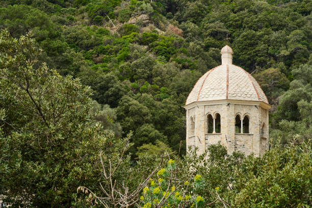 The bell tower of Abbey of San Fruttuoso, one-time Benedictine monastery built in the 10th century. It's located on the italian riviera between Camogli and Portofino. The abbey can only be reached by sea or by hiking trails. Camogli. Genova. Italy.