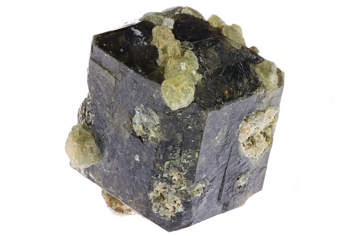 Iron pyrite from spain; natural cubic crystal set in host rock. Yellow metallic sides reflect with a mirror-like finish.