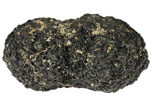manganese nodule recovered in the Pacific from a depth of approximately  4000m between Hawaii and Mexico (Clarion-Clipperton-Area) isolated on white background