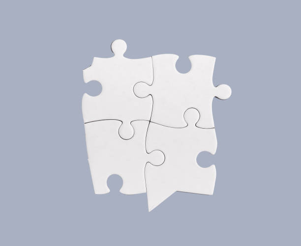 istock Connected puzzle pieces, joined jigsaw, synergy concept 1611948633
