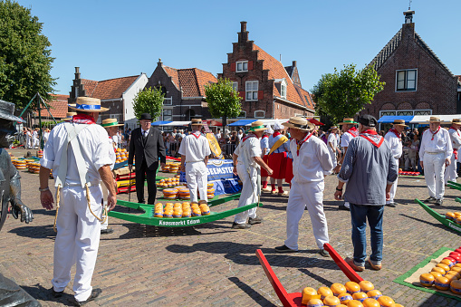 Edam, Netherlands, August 10, 2022; Cheese carriers and traders at the cheese market in Edam.
