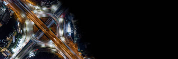 istock Expressway top view, Road traffic an important infrastructure, Drone aerial view fly in circle, traffic transportation, Public transport or commuter city life concept of economic and energ, transport 1612026284