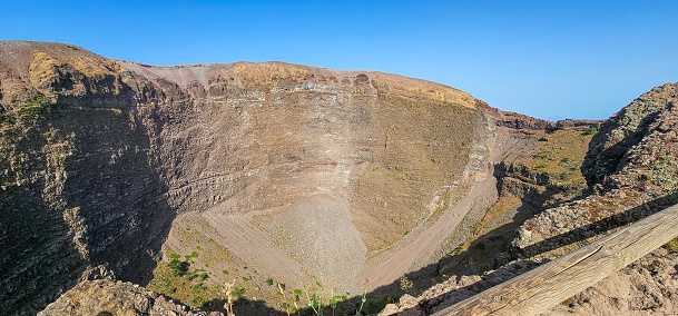 This photo offers a glimpse into the heart of the iconic volcano's crater. The rugged terrain and volcanic formations create a surreal and otherworldly landscape. With its historical significance stemming from the infamous eruption in AD 79, which buried Pompeii and Herculaneum, the image captures the awe-inspiring and primal nature of this natural wonder, reminding us of the Earth's geological power and its impact on human history.