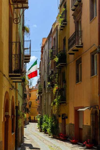 Italian smal street with italkian flag stock photo