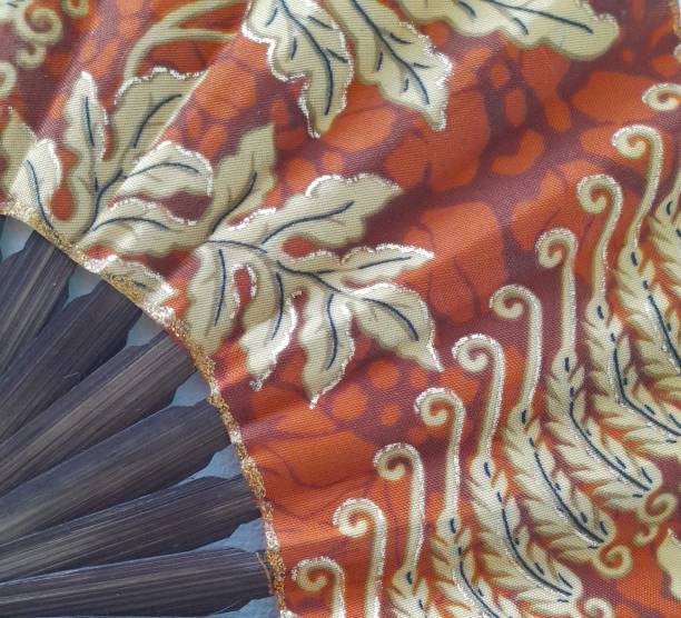 istock Indonesian batik fan 1612061697