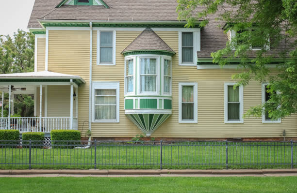 istock Yellow House Green Abilene 1612074388