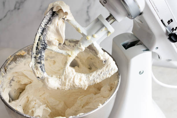 Mixed Vanilla Buttercream Icing in a Stand Mixer