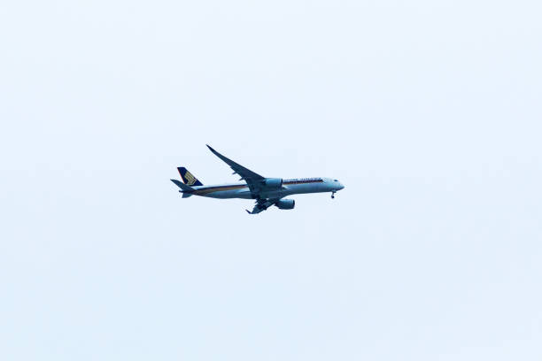 Singapore Airlines  airplane in landing mode over Lat Krabang  in Bangkok on way to Survanabhumi airport