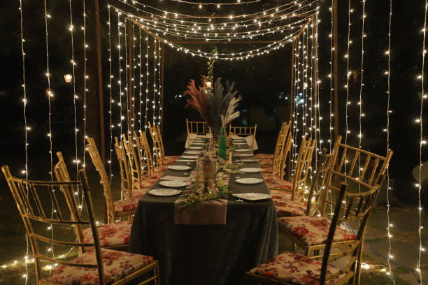 istock Decorated dining area for dinner with beautiful lighting 1612134999