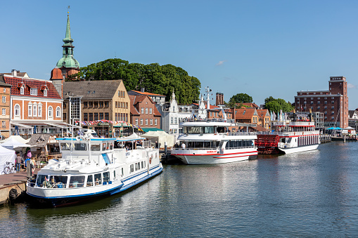 Kappeln, Germany - June 10, 2022: pleasure boats in the city of Kappeln in Schleswig-Holstein, Germany