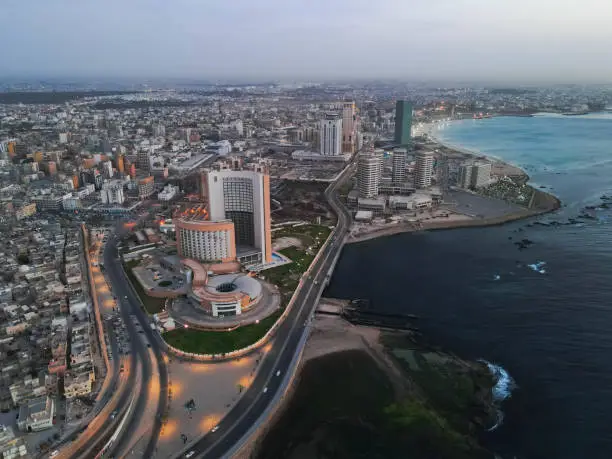 Dive into a spectacular aerial collection featuring Tripoli's downtown skyline, including the iconic Martyrs' Square. These high-definition videos capture the essence of Libya's capital, spotlighting its defining towers and the pulsating heart of the city, Martyrs' Square. Seamlessly blending ancient artistry with contemporary design, the footage offers viewers an unparalleled bird's-eye view of a city where millennia-old history meets tomorrow's horizon. Perfect for documentary filmmakers, historians, or any visual project, this collection illuminates Tripoli's grandeur from an unmatched vantage point. Exclusive to Getty Images.