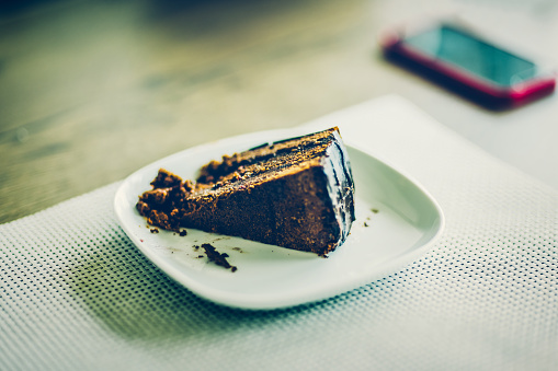 Homemade chocolate cake on plate.
