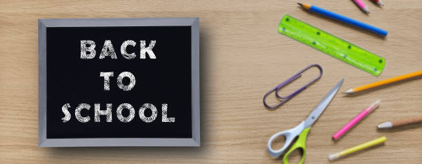 istock Back to school banner. Inscription on chalkboard. 1612382284