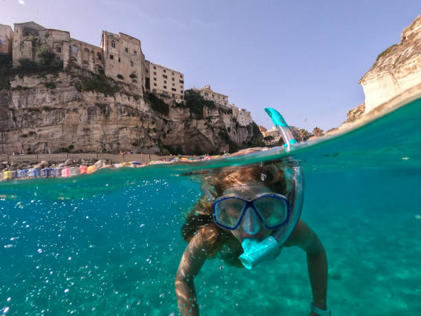 Diving in Tropea On the beach of Tropea Calabria Italy calabria stock pictures, royalty-free photos & images