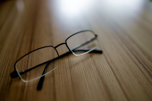 Glasses on a holh background in sunlight