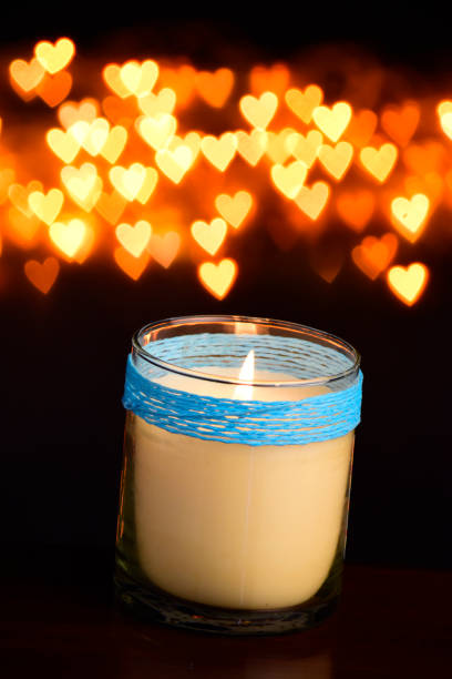 istock Candle glass jar on dark background, candle romantic concept 1612437145