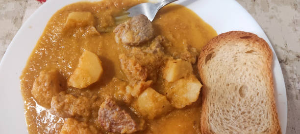 istock chicken tenderloins with potatoes in tomato sauce 1612439266