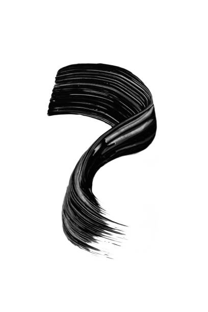 istock Black mascara brushstroke swatch isolated on white background. 1612483232