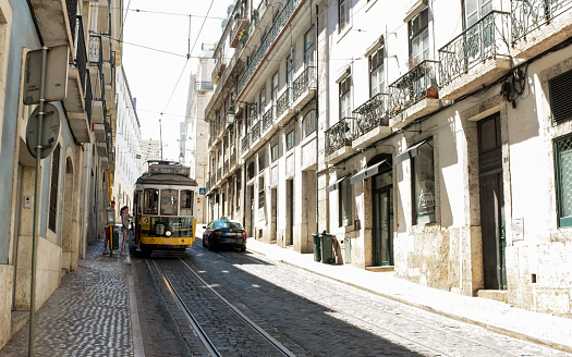 Vintage tram on the street in the historic center of Lisbon.