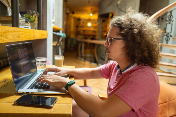 istock Man working on the laptop in a cafee 1612535681
