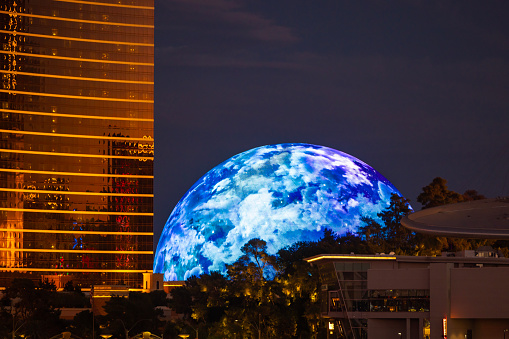 Las Vegas, USA - August 08, 2023: The MGM Sphere in Las Vegas, Nevada. This is the highest resolution wrap around LED screen in the world. The exterior design often changes. Here it can be seen with an abstract cloud/planet like design.
