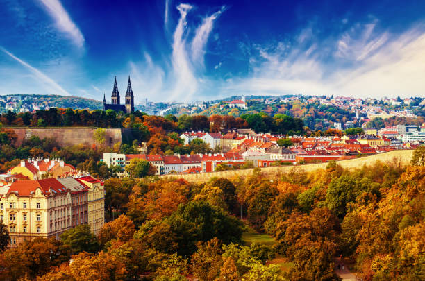 View to the Vysegrad in Prague, Czech Republic at autumn with cathedral and red roofs, travel seasonal vintage hipster background
