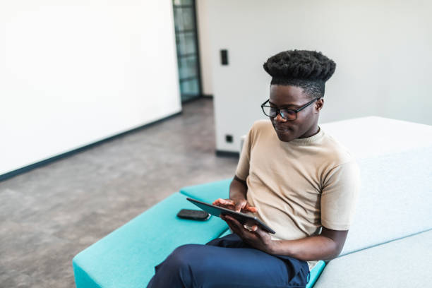 istock One Black businessman working at new startup from modern office using digital tablet 1612604712