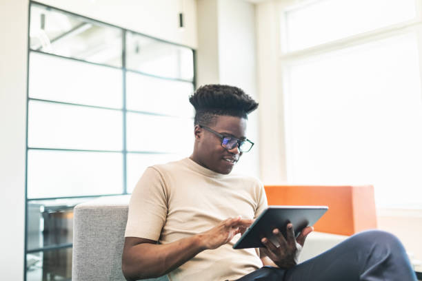 istock One Black businessman working at new startup from modern office using digital tablet 1612610330