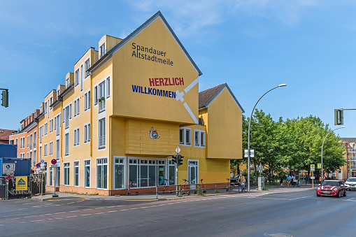 Berlin, Germany - June 13, 2023: Historic centre and old town of the Spandau borough in the western suburbs with the street Am Juliusturm and rental houses