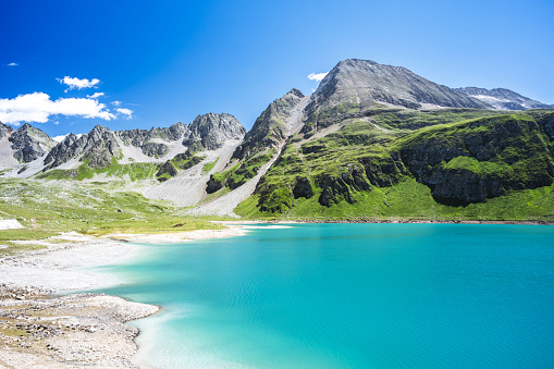 The beautiful turquoise colored Castel lake, in Northern Italy (Piedmont), near the Swiss border.