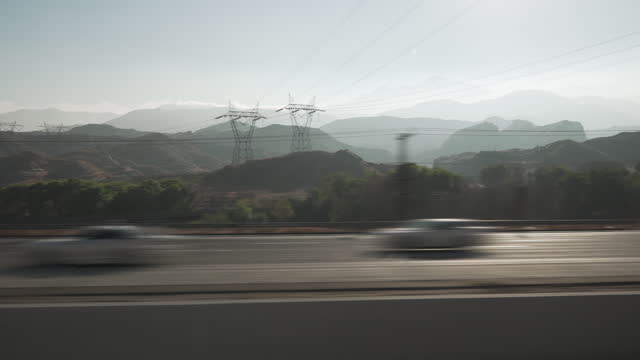 side view from moving car of mountains near Los Angeles