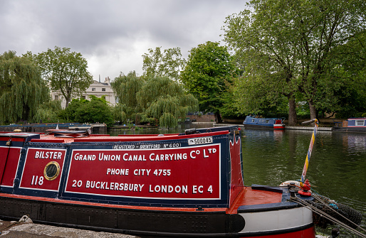 London, UK: Canal boats at Little Venice in London. This is the junction where Regent's Canal meets the Paddington branch of the Grand Union Canal.