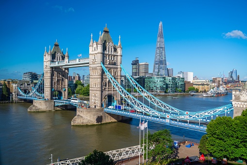 London, United Kingdom – July 18, 2022: Tower Bridge in London, England, UK with a skyline view in the background