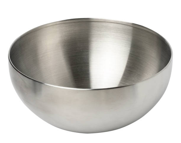istock Deep stainless steel bowl on a white insulating background 1612712938