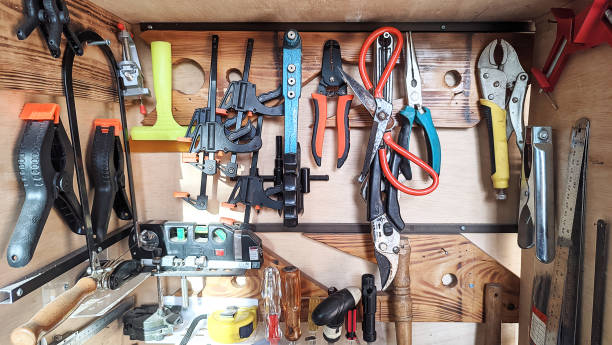 istock A collection of assorted handyman tools hanging in a tool cupboard 1612805678