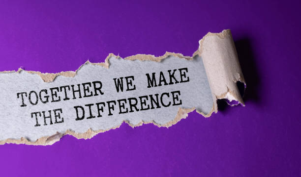 istock Together We Make A Difference appearing behind torn paper. Business concept. 1612808758